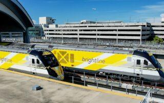 Two trains looking WEST w Term C | Luxury Orlando Homes for Sale | Daniel Wilson REMAX Orlando Real Estate Expert